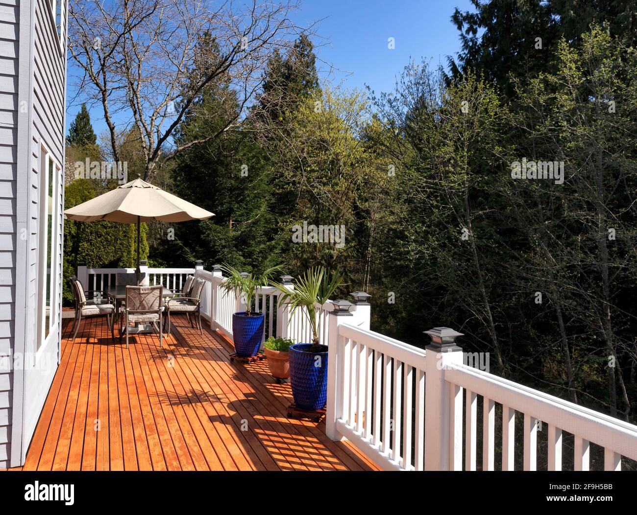 Home outdoor deck freshly painted during lovely spring day Stock Photo