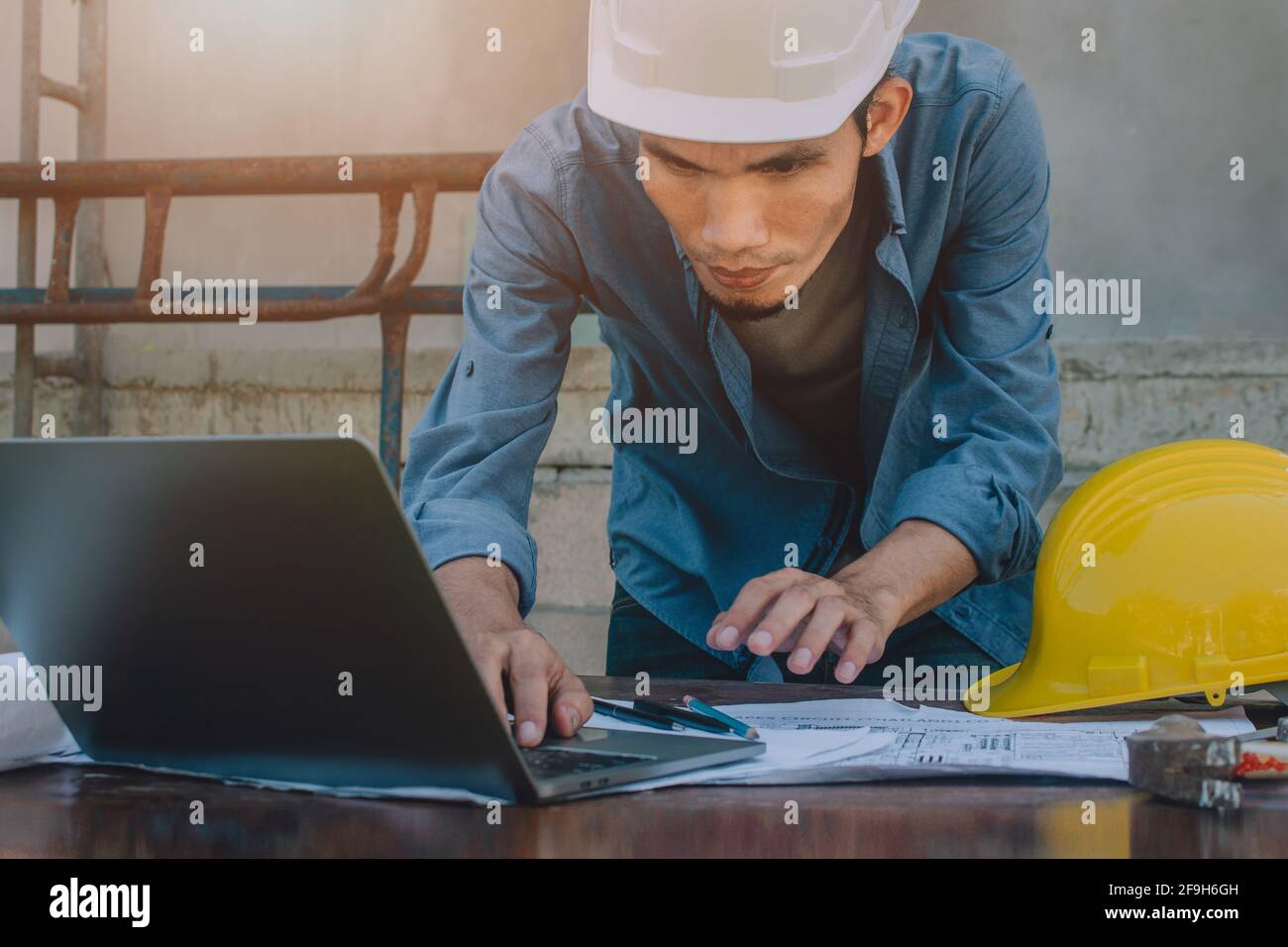 Check Up Engineering Engineer checking design building construction by computer technology ...
