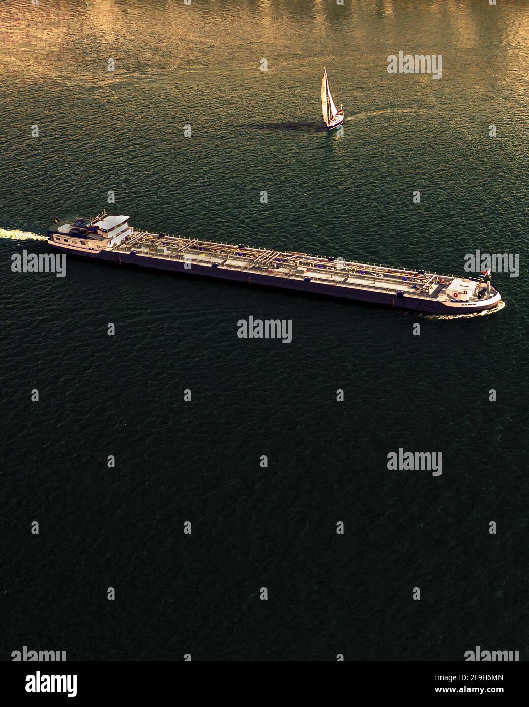 Beautiful vertical shot of a sailing ship in the ocean Stock Photo - Alamy
