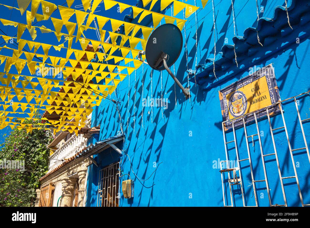 Scenic colorful streets of Cartagena in historic Getsemani district near Walled City, Ciudad Amurallada. Stock Photo