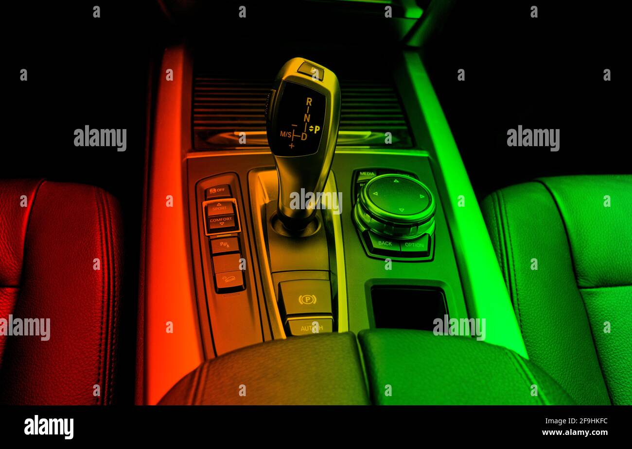 Automatic gear stick (transmission) of a modern car in red and green
