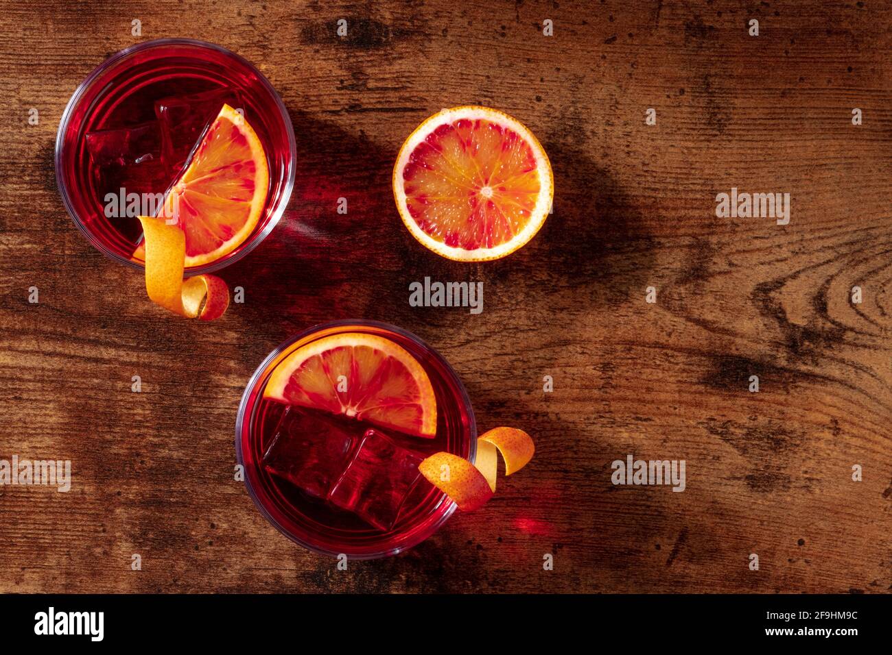 Cocktails with blood orange juice, overhead shot with copy space Stock