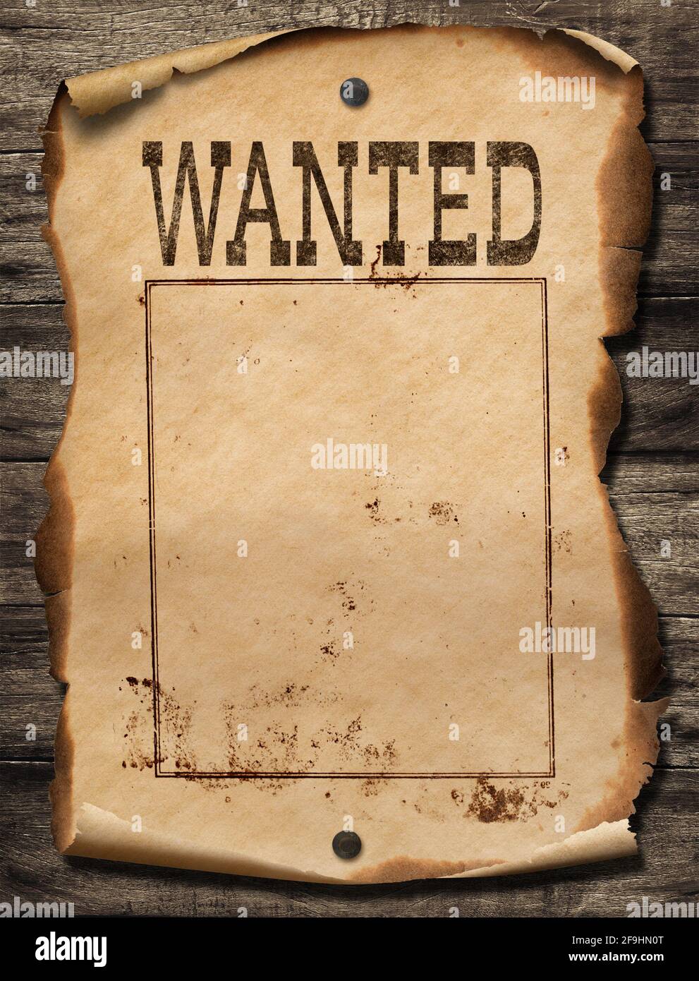 Wild west wanted poster on wood wall Stock Photo
