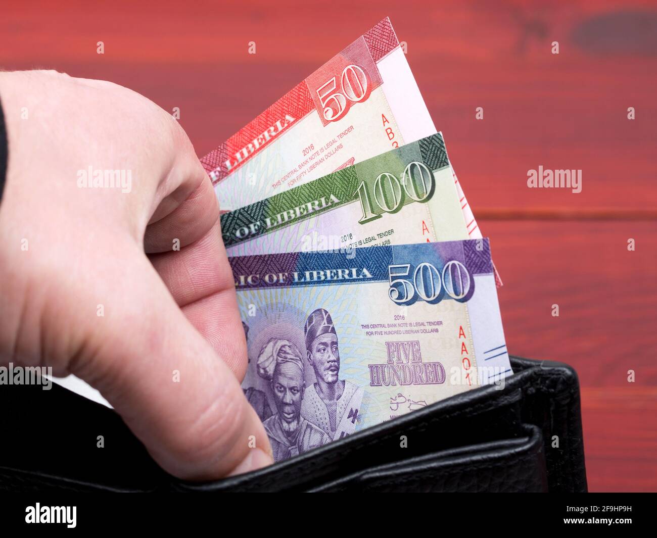 Liberian Money Dollar In The Black Wallet Stock Photo Alamy liberian-money-dollar-in-the-black-wallet-stock-photo-alamy