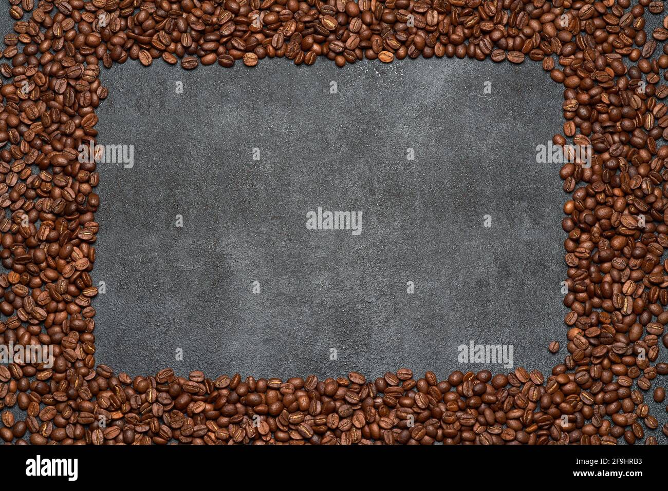 Background or texture made of roasted brown coffee beans Stock Photo ...
