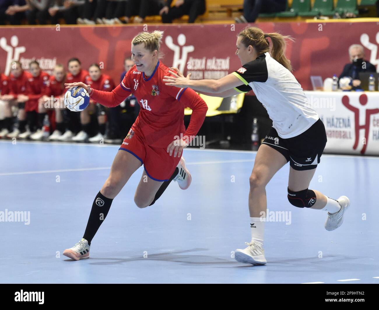 Zubri, Czech Republic. 17th Apr, 2021. Kamila Kordovska (CZE; left) in action during the opening match of the play-off qualification for the IHF World Women's Handball Championship, Czech Republic vs Switzerland, on April 17, 2021 in Zubri, Czech Republic. Credit: Dalibor Gluck/CTK Photo/Alamy Live News Stock Photo