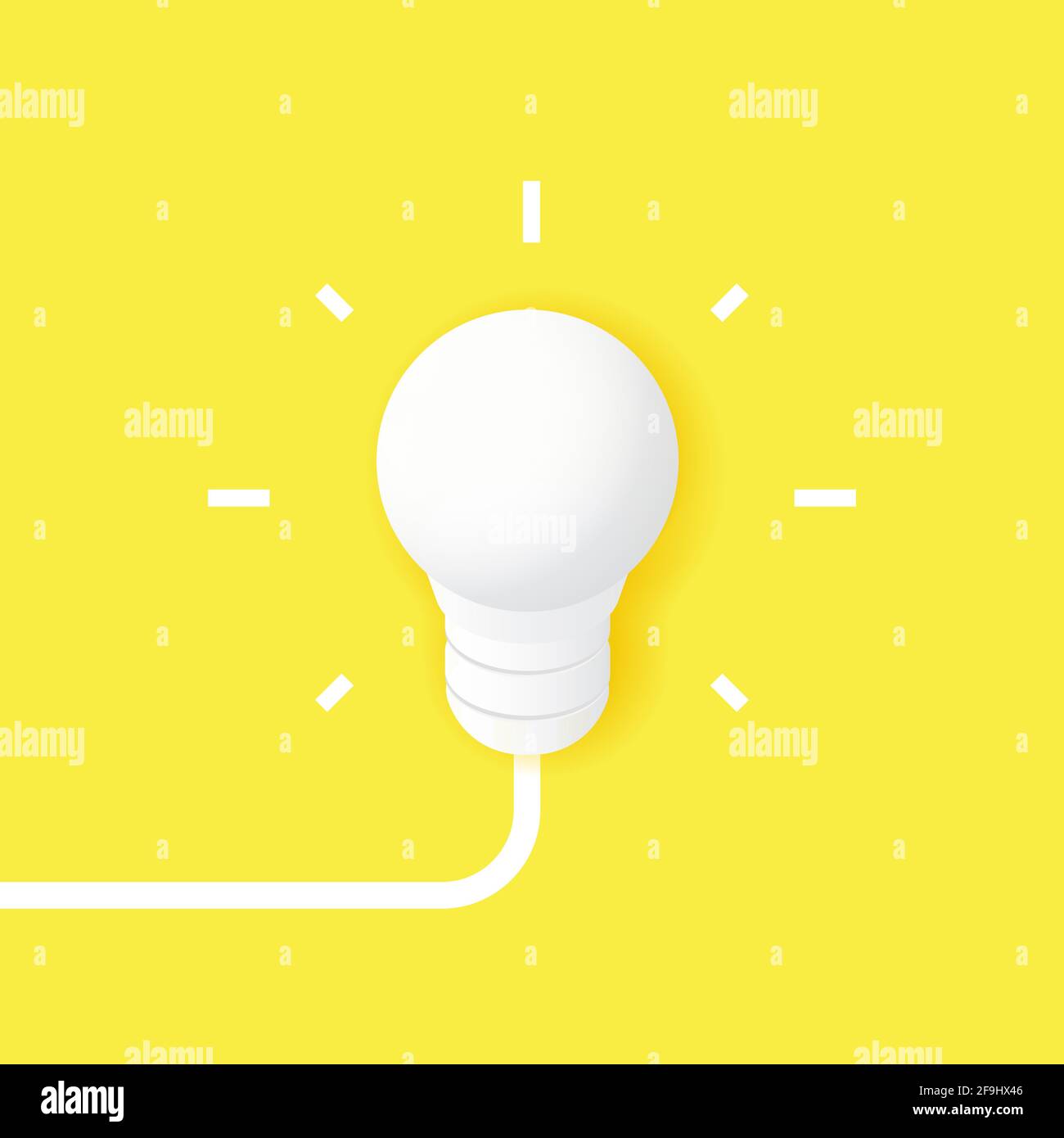 The concept of a big idea and creativity. White light bulb on a yellow ...