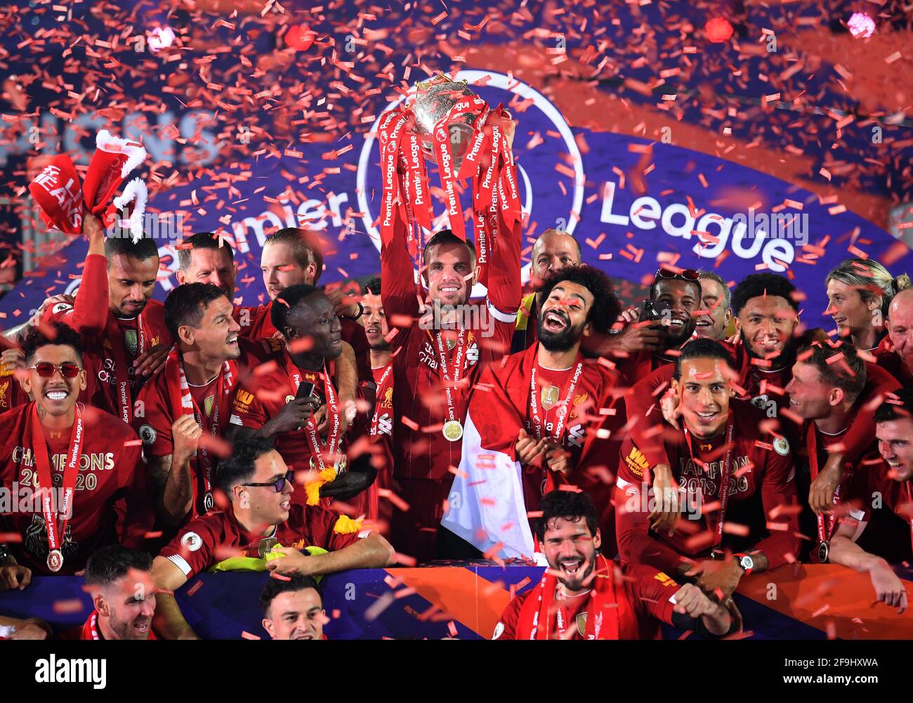 File photo dated 22-07-2020 of Liverpool captain Jordan Henderson (centre) and his team-mates celebrates with the Premier League Trophy. Issue date: Monday April 19, 2021. Stock Photo