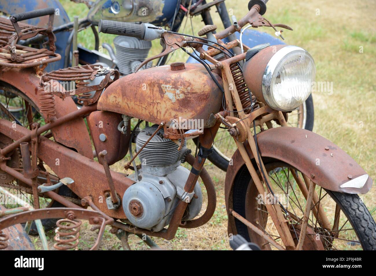 Rusty Old Peugeot Motorbike Stock Photo