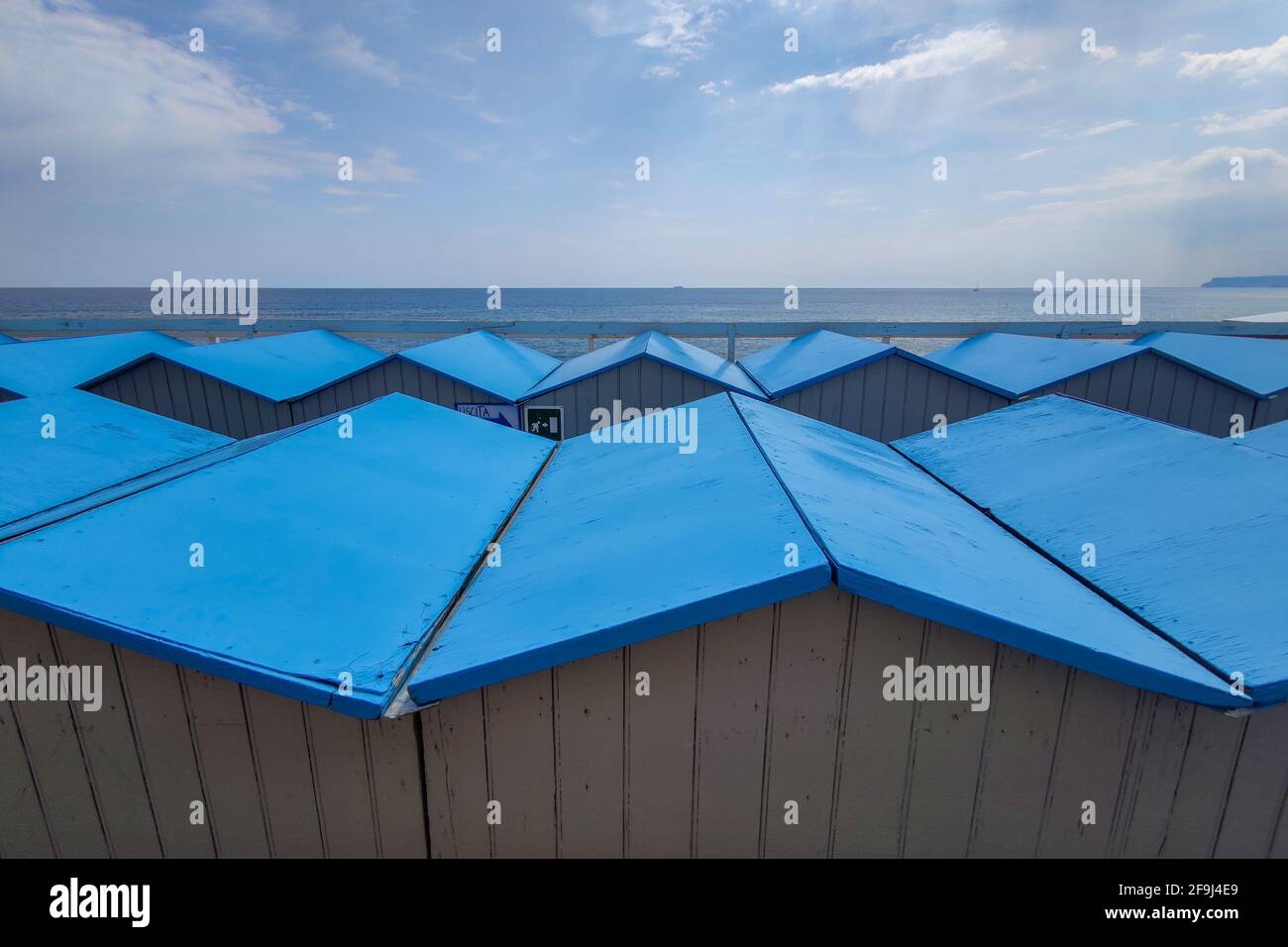 Bathhouse beach club preparation set up for summer season in Italy