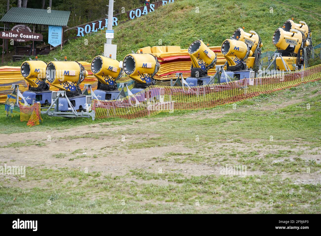 Snow gun machine waiting for frost with sun flare background, snowmaker  machine. Color effect Stock Photo - Alamy