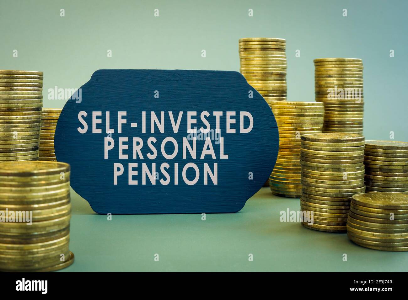Self-Invested Personal Pension SIPP words on the black plate. Stock Photo