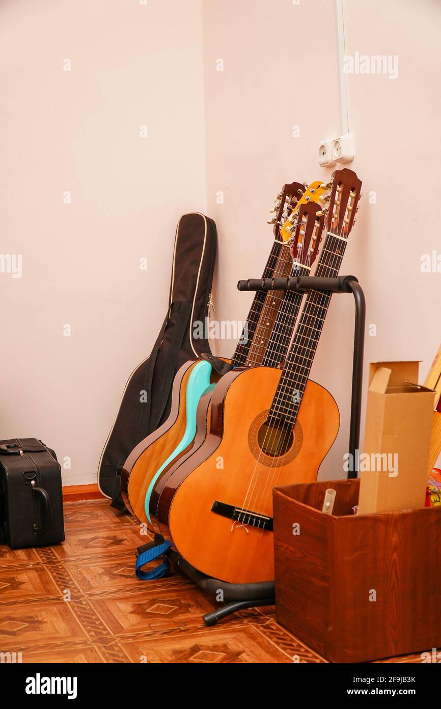 Guitar in white wood room hires stock photography and images Alamy