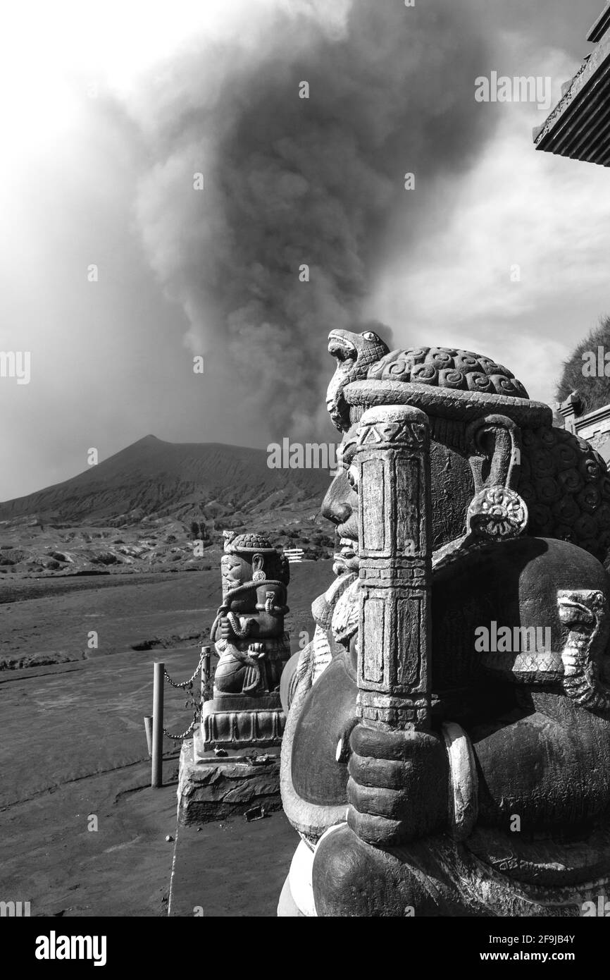 Pura Luhur Poten (Hindu Temple) With An Erupting Mt Bromo In The ...