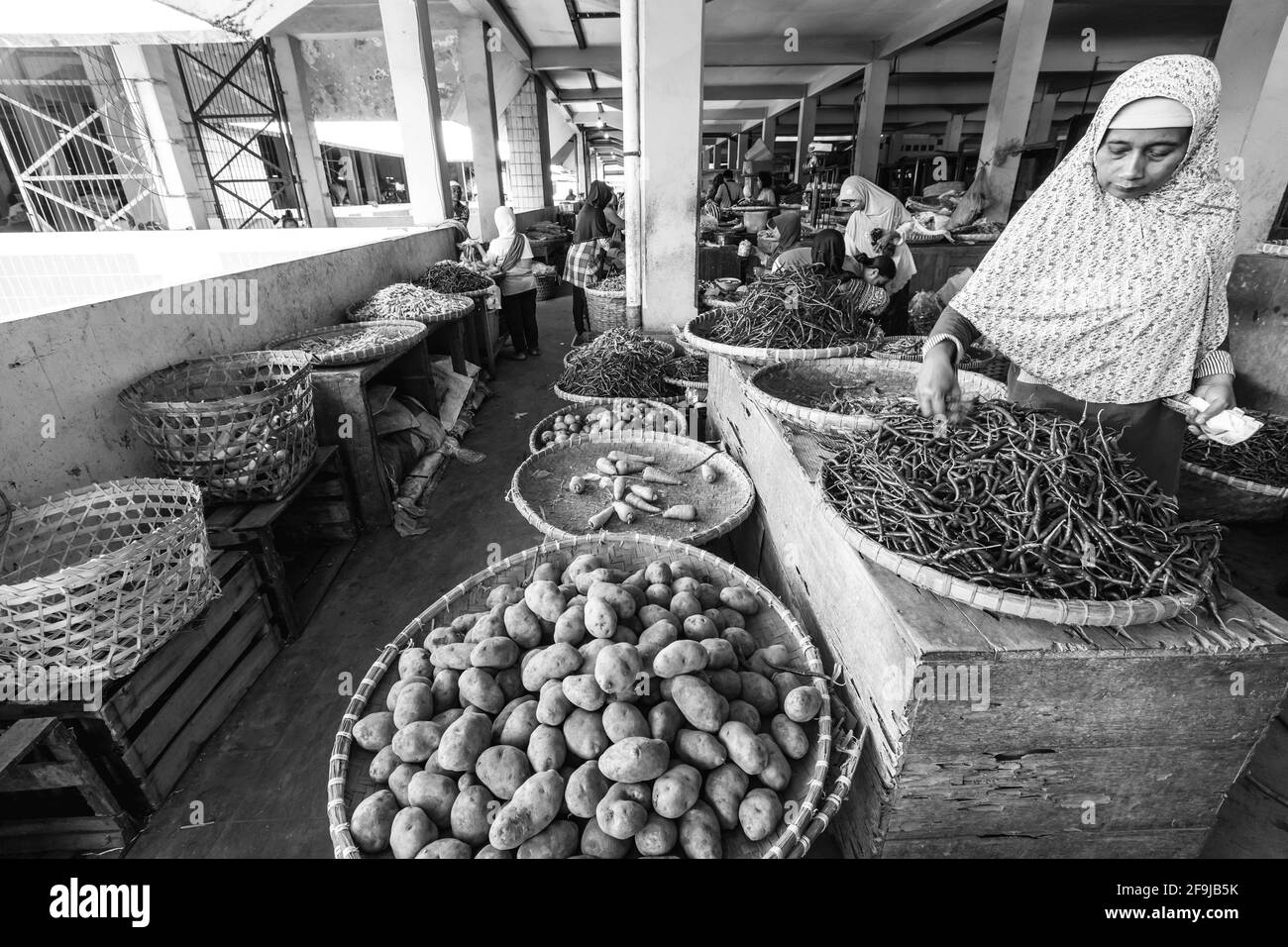 Local Women Buying Chilli Peppers At Beringharjo Market, Yogyakarta, Java, Indonesia. Stock Photo