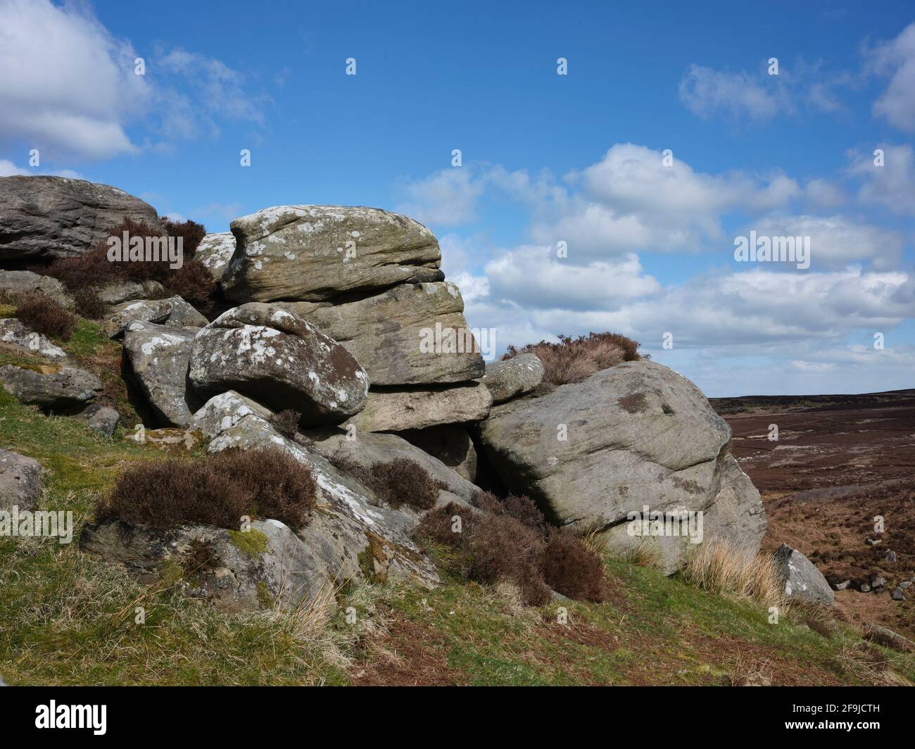 Large boulders at a rocky outcrop on moorland above Fosse Gill Stock Photo