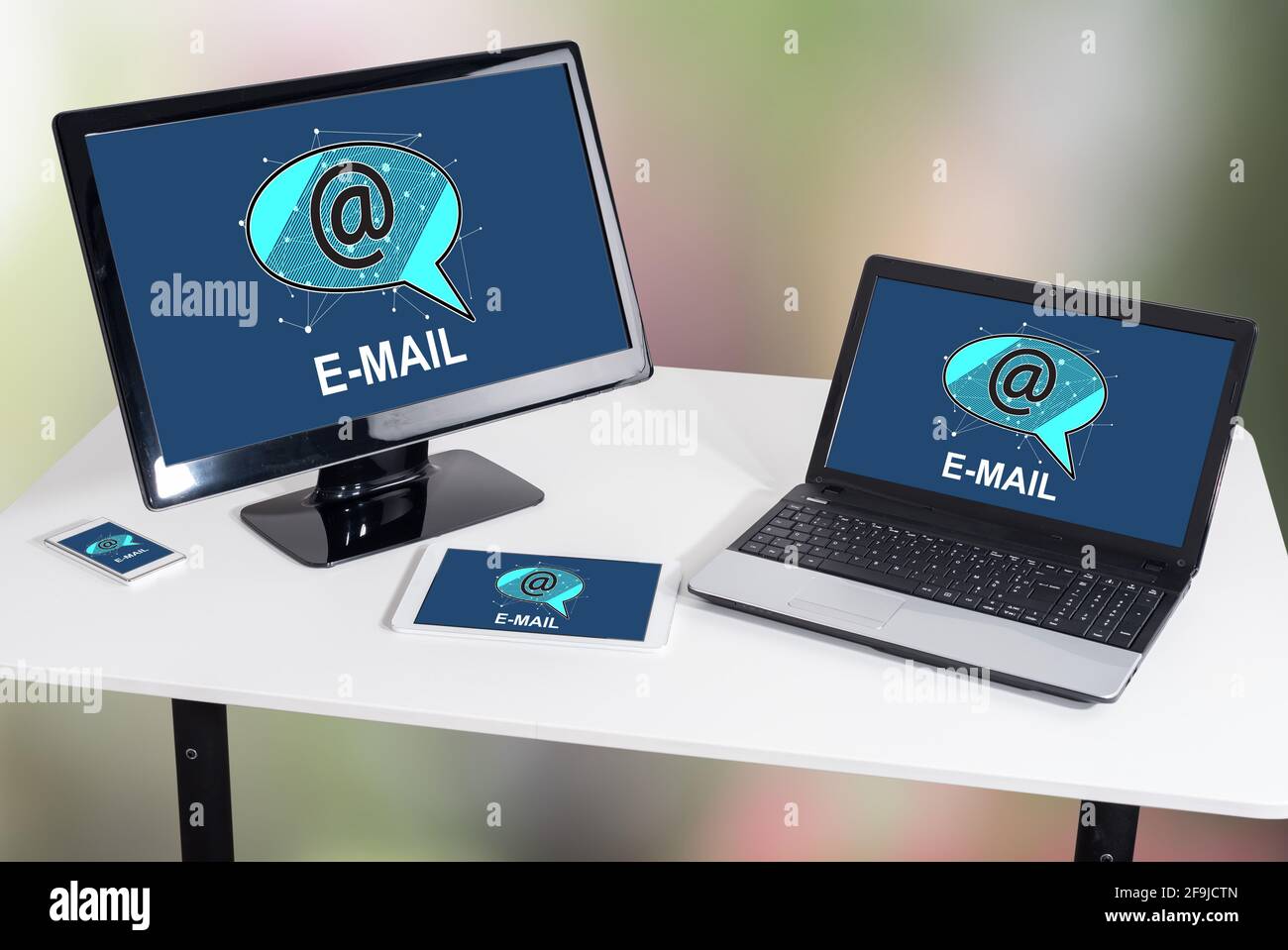 Email concept shown on different information technology devices Stock ...