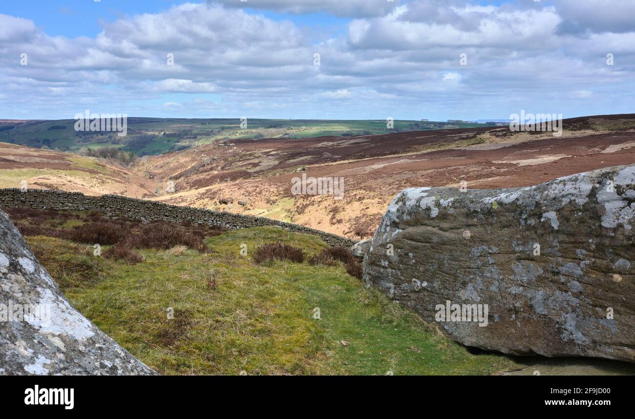 View of Nidderdale from a rocky outcrop above Fosse Gill Stock Photo