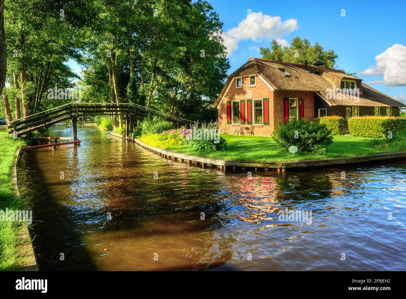 Idyllic Giethoorn village in Netherlands, called 'Dutch Venice', famous for its canals and waterways Stock Photo