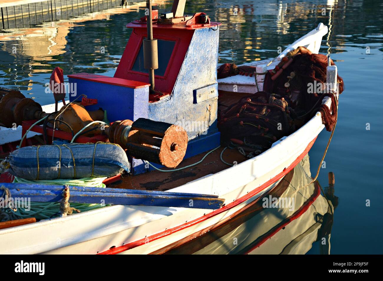 Traditional Greek fishing boat with fishing equipment in Peloponnese