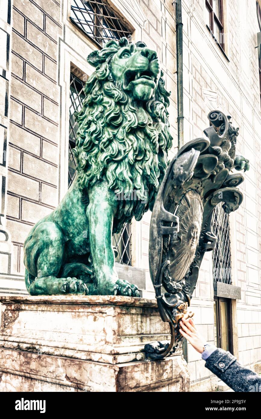 Vertical shot of a famous lion statue in Odeonplatz, Munich Stock Photo ...