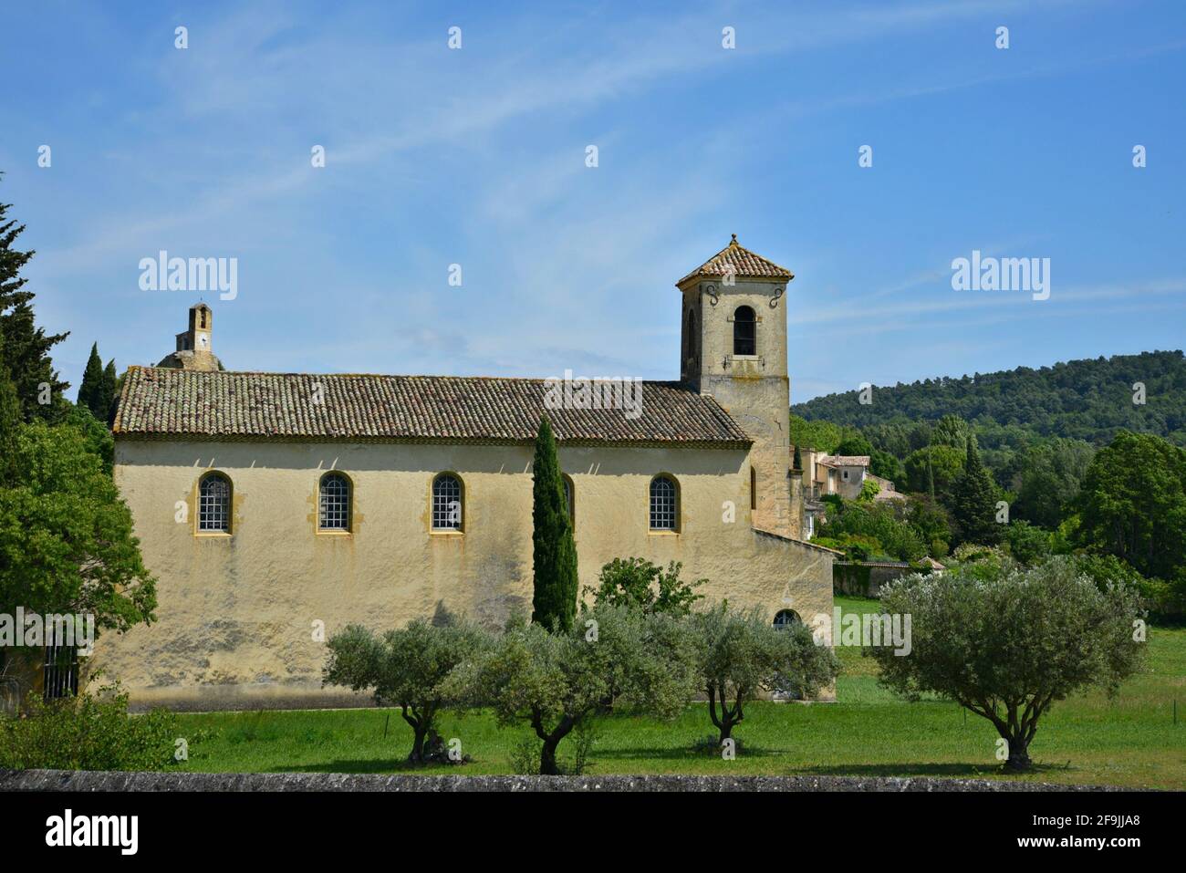 Landscape with scenic view of the Protestant Temple a landmark in the countryside of Lourmarin, Vaucluse Provence, France. Stock Photo