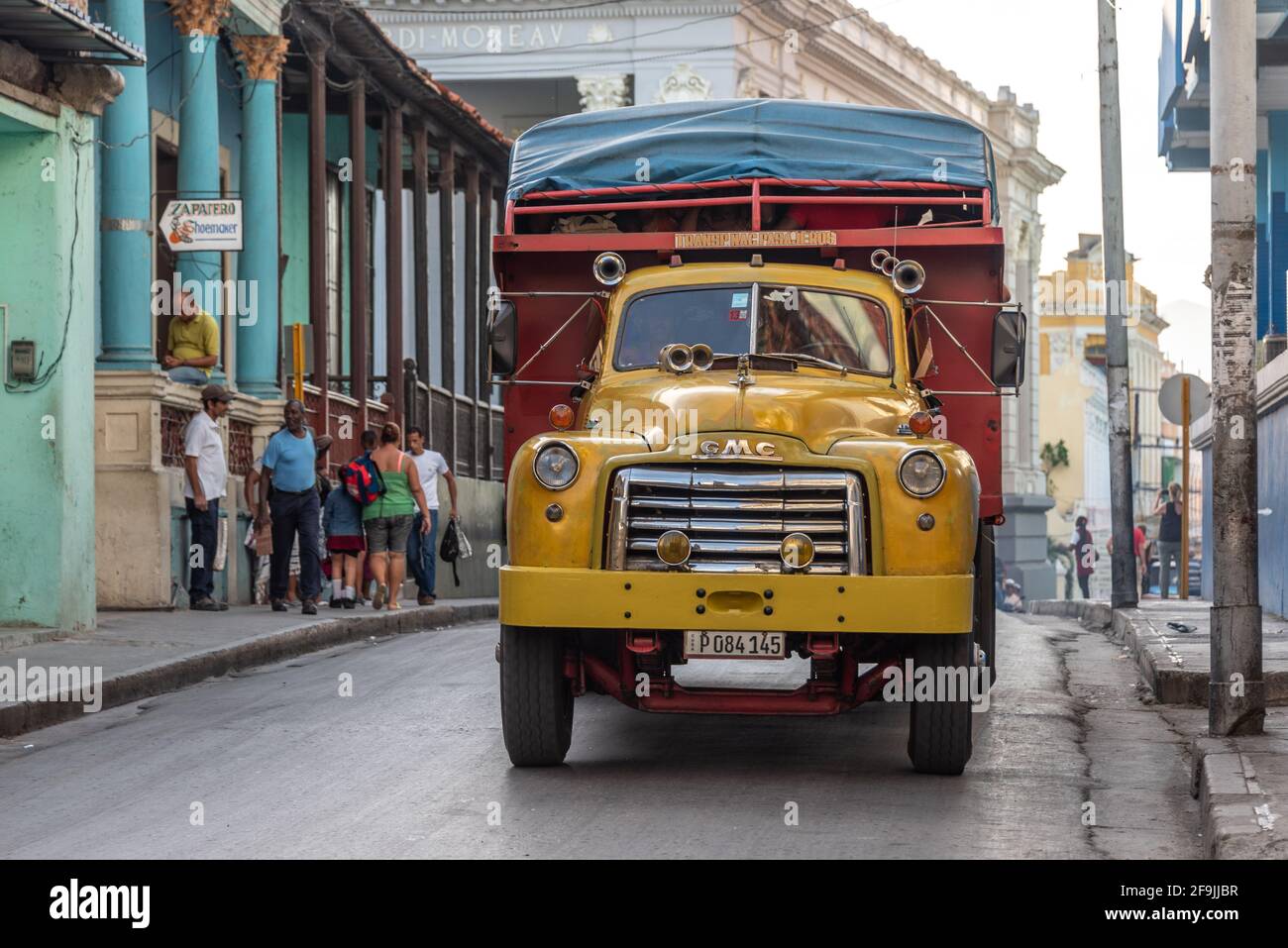 Urban passenger transportation in vintage American GMC truck, Santiago de Cuba, Cuba Stock Photo