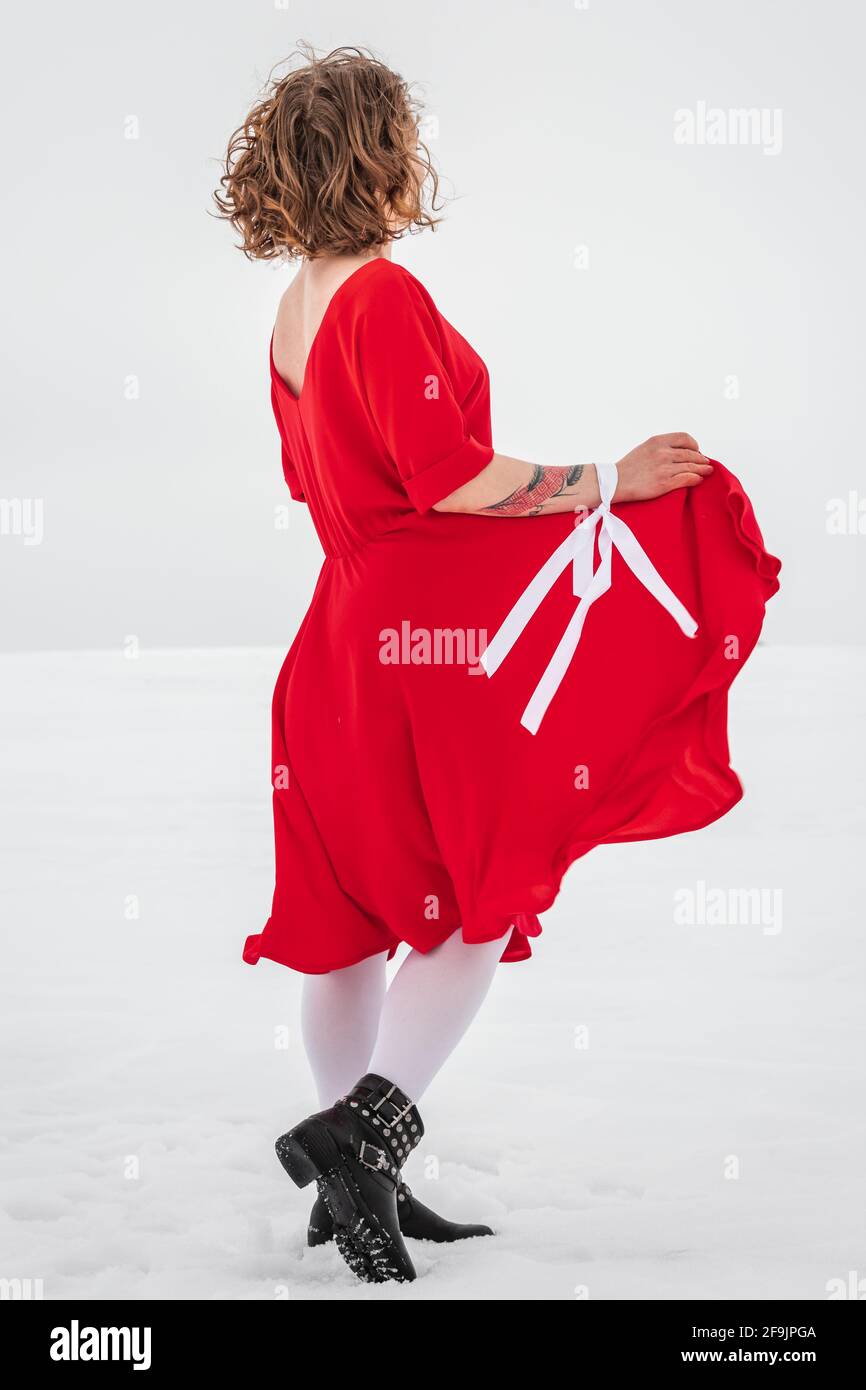 Beautiful woman in a red dress Stock Photo - Alamy