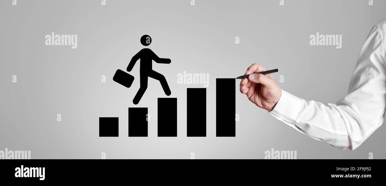 Businessman draws a stickman climbing the steps of career. Career planning, achievement and success in business. Stock Photo