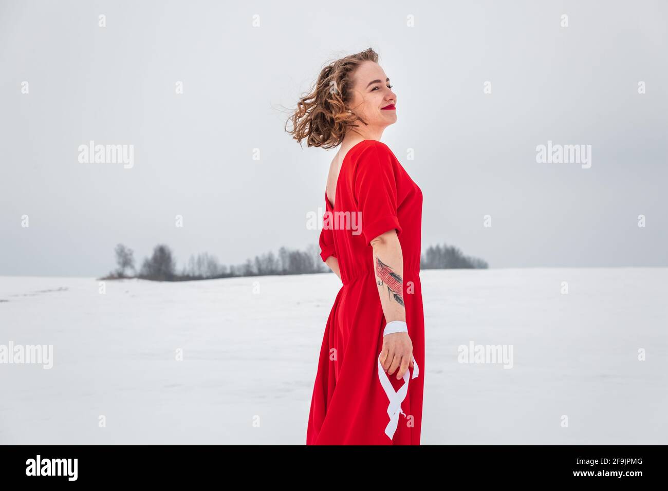 Beautiful woman in a red dress Stock Photo - Alamy