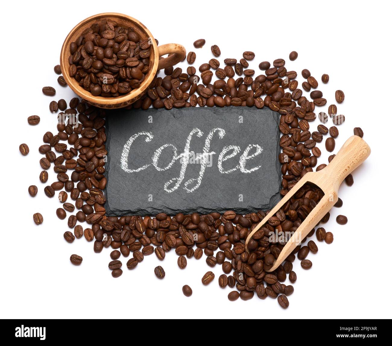 stone serving board with chalk handwritten sign, cup of espresso and