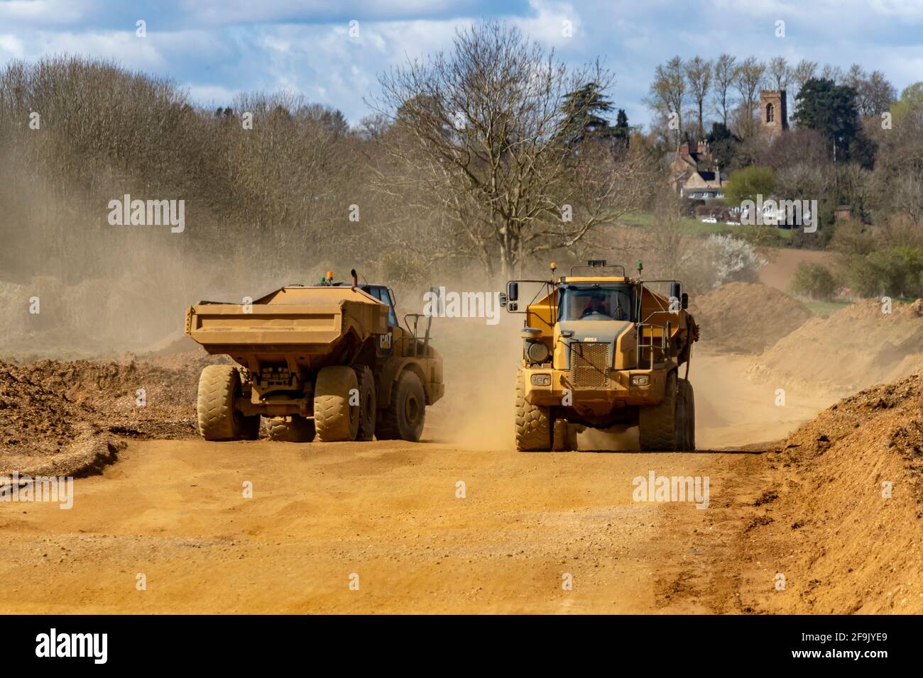 Articulated Trucks working at Hanson Aggregates new quarry along the Nene Valley between Cogenhoe and Grendan, Nortahmptonshire, UK. Stock Photo