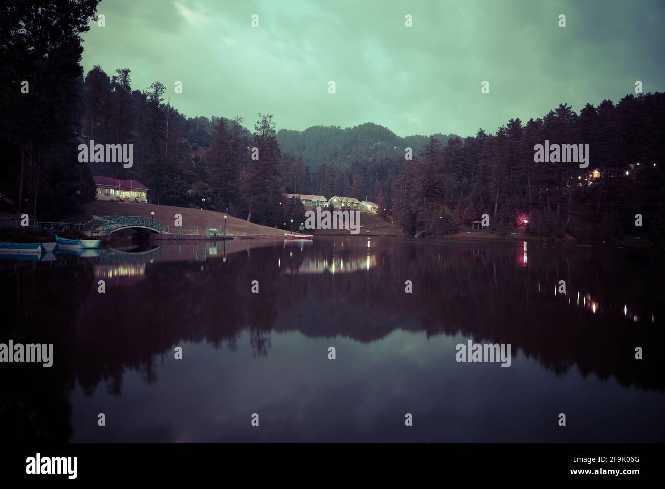 Reflection of tourist resort in Banjosa Lake in Rawalakot District of Pakistan Administered