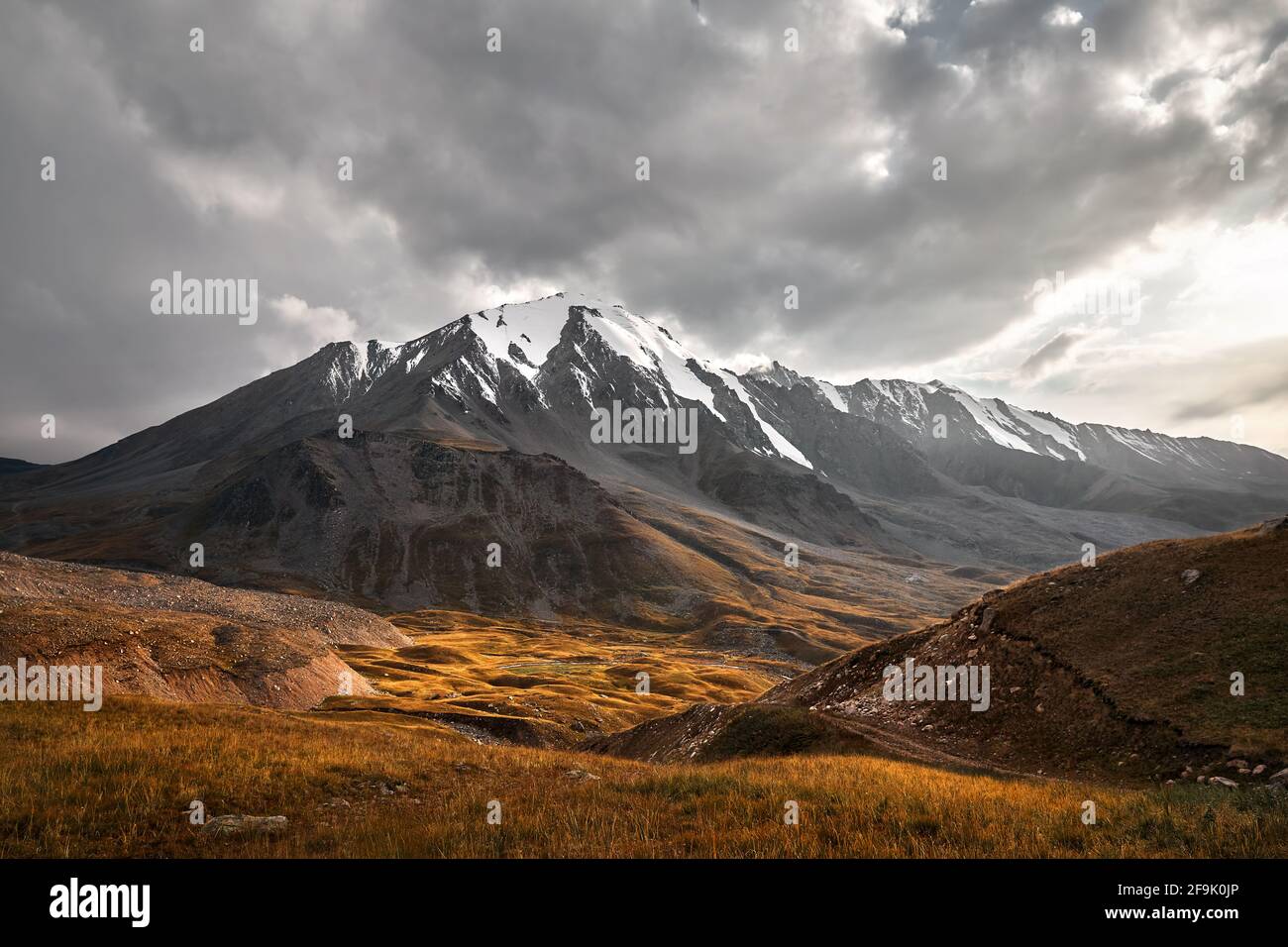 Landscape of beautiful summit in Tian Shan Mountains Valley at sunset in Almaty, Kazakhstan Stock Photo