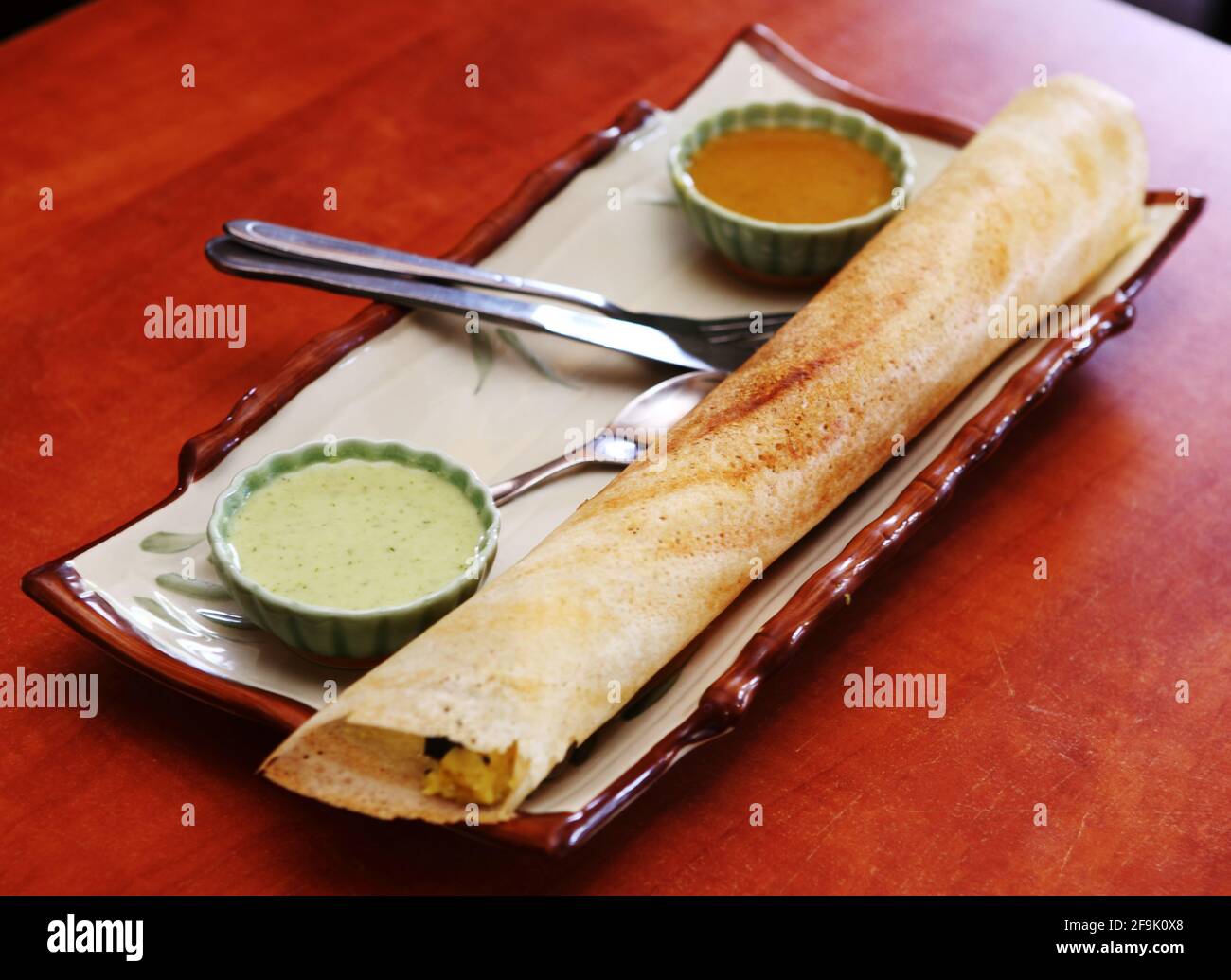 Masala Dosa famous south Indian vegetarian snacks Stock Photo - Alamy