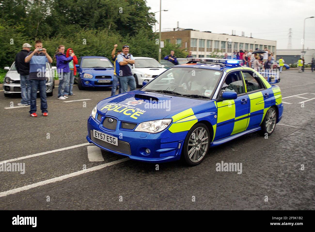 Police Interceptors. ANPR equipped police car made famous by TV programme, at a car event at the Prodrive racing car centre. Driving past public Stock Photo