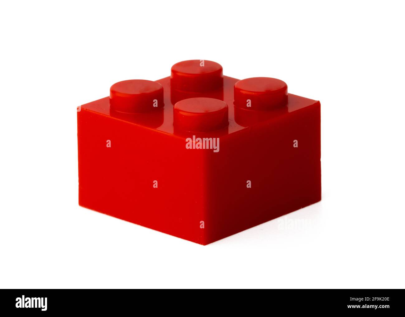 Colored plastic toy building block isolated on white Stock Photo - Alamy