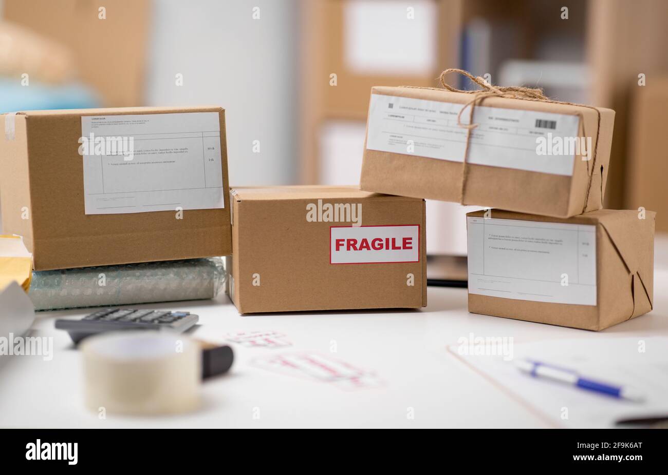 parcel boxes and packing stuff at post office Stock Photo Alamy