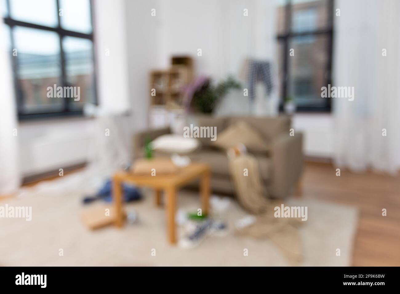 interior of messy home room with scattered stuff Stock Photo
