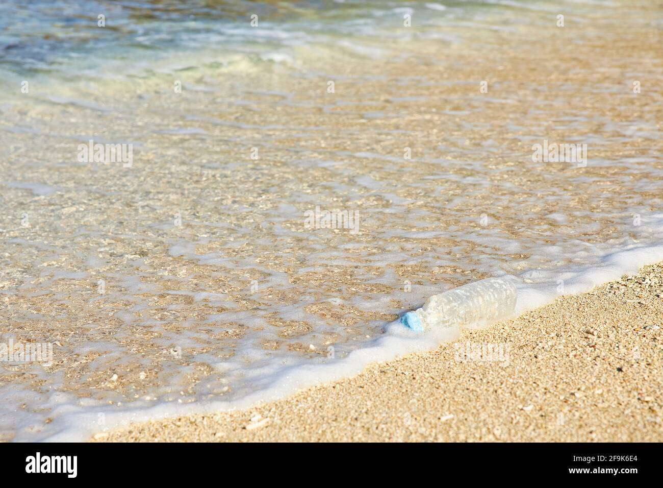 Plastic Bottle on the Beach Stock Photo