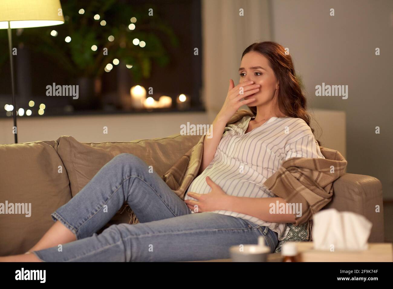 Sick Pregnant Woman Coughing At Home Stock Photo Alamy