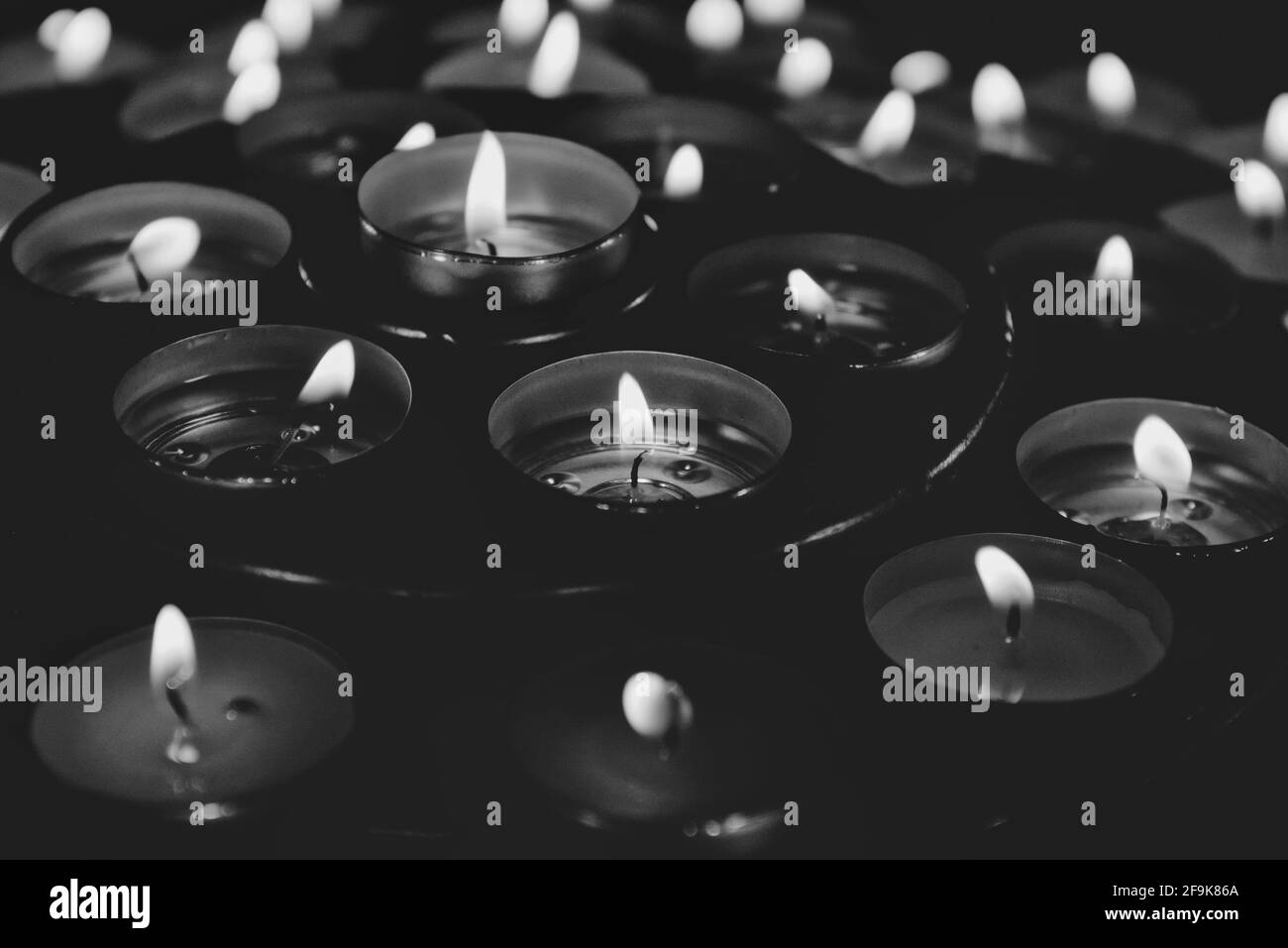 Votive candle in black and white Stock Photo Alamy