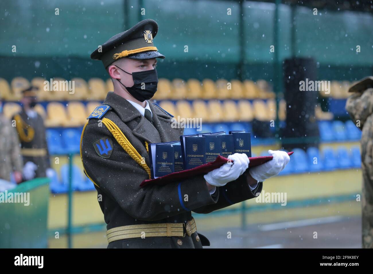 LVIV REGION, UKRAINE - APRIL 16, 2021 - An honour guard hold the distinctions of the Ukrainian Defence Ministry to be awarded to US officers during th Stock Photo
