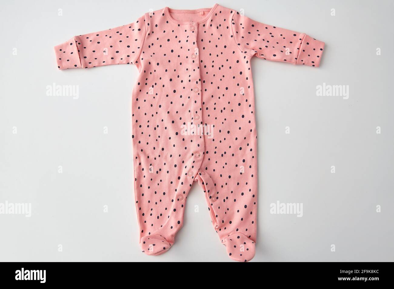 pink bodysuit for baby girl on white background Stock Photo Alamy
