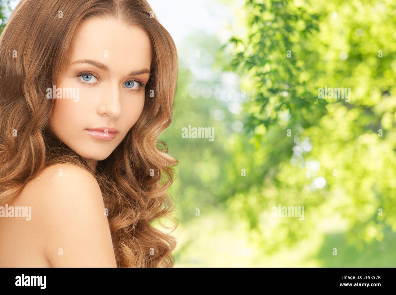 Nice female curly hair hi-res stock photography and images - Alamy