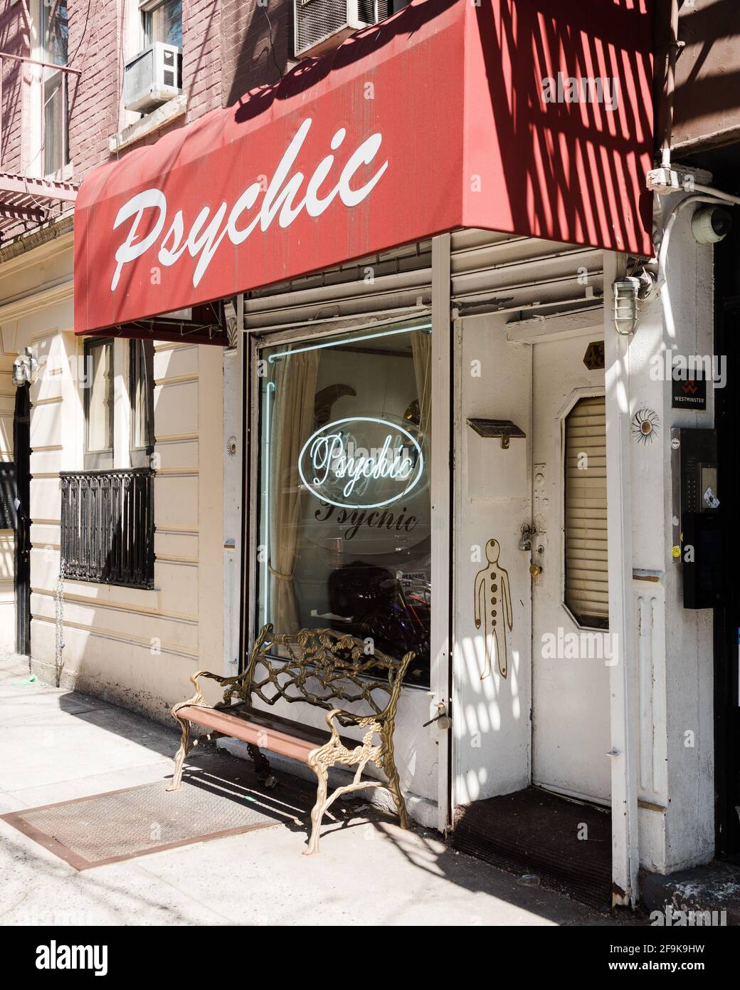 Red psychic sign in the East Village, Manhattan, New York City Stock Photo