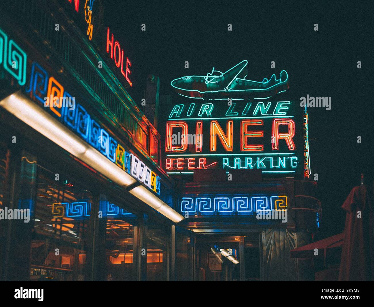 Retro Jackson Hole Diner neon sign at night, in Astoria, Queens, New