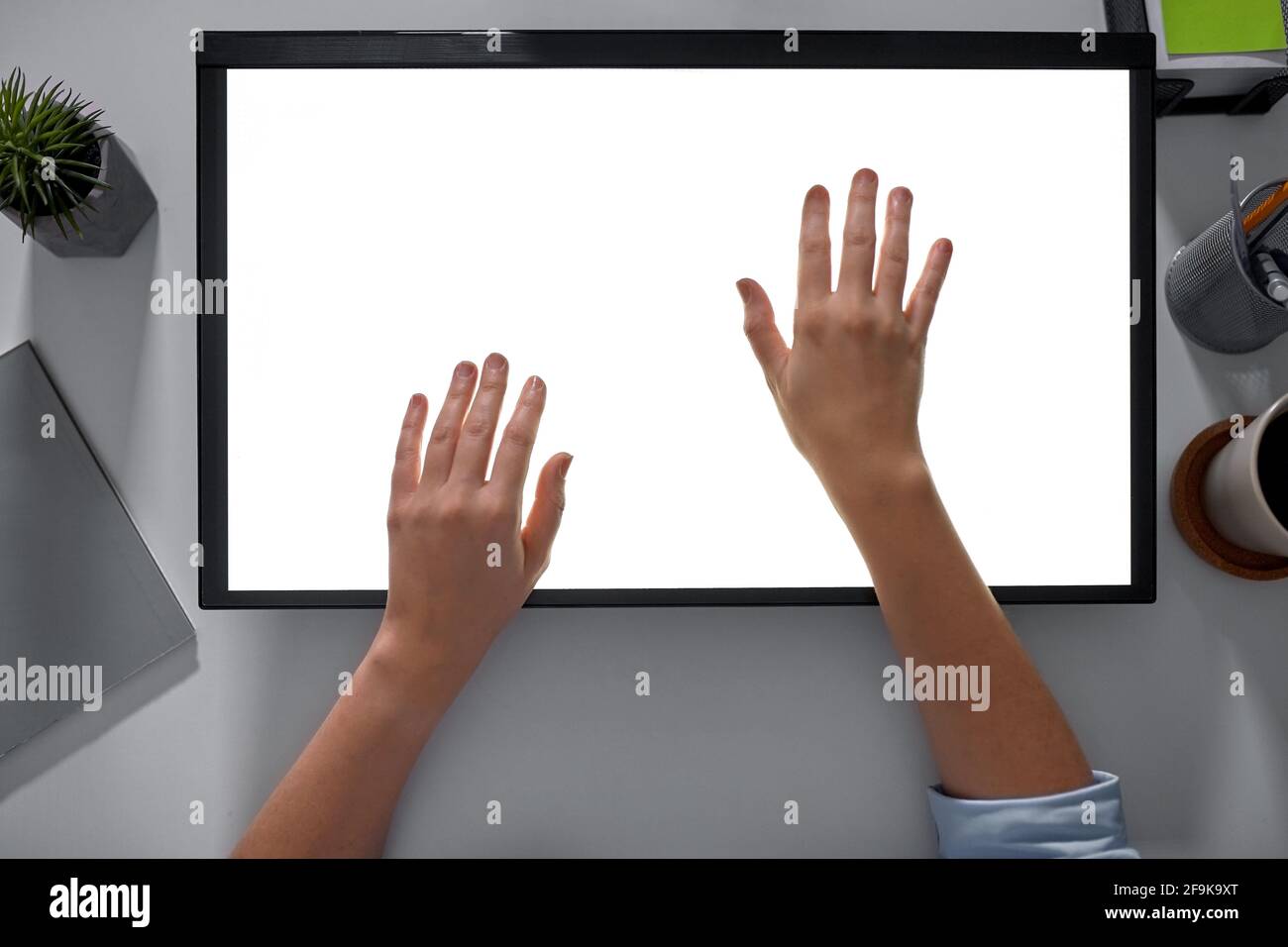 hands on led light tablet at night office Stock Photo