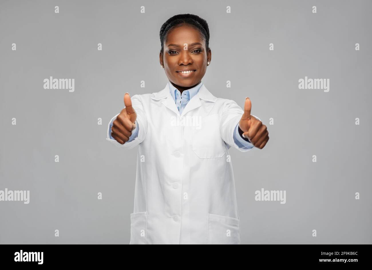 African american doctor thumbs up hi-res stock photography and images ...