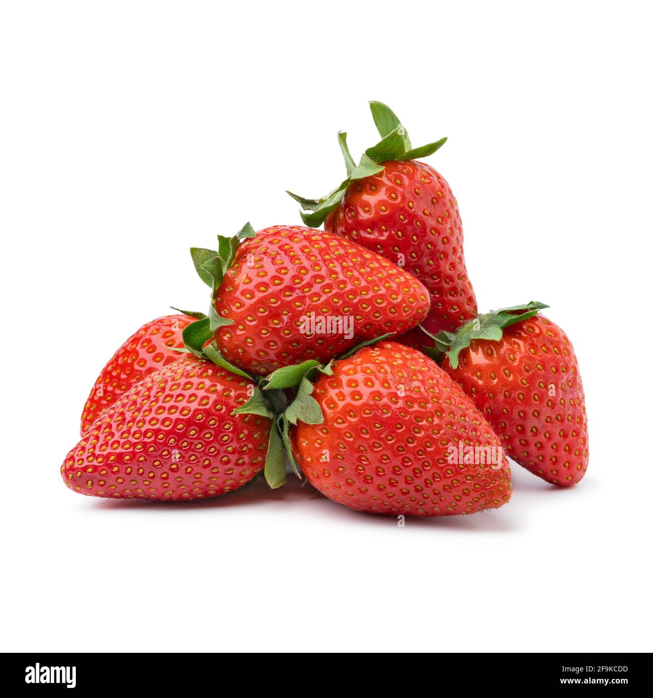 Heap of fresh picked red ripe strawberries isolated on white background Stock Photo
